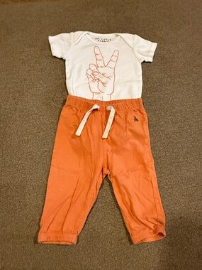 White Peace Sign Graphic Tee and Orange Jogger Set